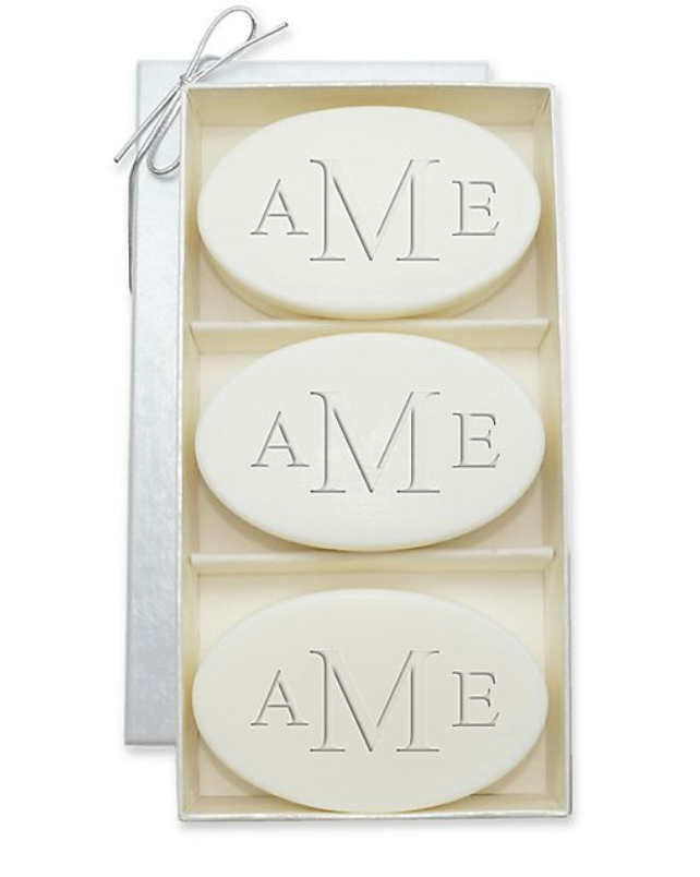 three oval soaps in a luxurious container monogrammed with aMe