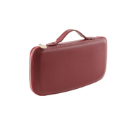 Red clutch with Genuine Nappa Leather interior and exterior with an injection molded plastic shell to help retain shape and add protection; gold colored zipper wraps all the way around the clutch; Gold colored engraved zipper tag. 