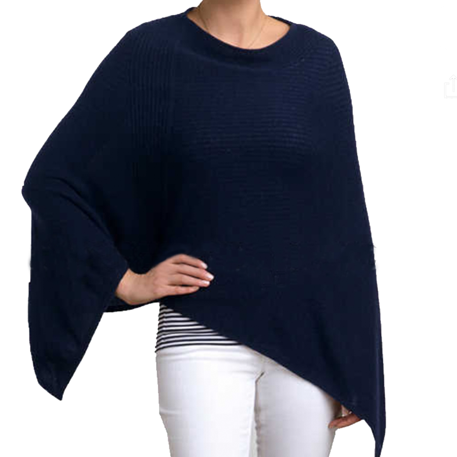 Our Essential Cashmere Poncho in William Grace Navy is the perfect layering piece for resort wear in our latest livable luxury collection. This intensely soft piece sports a 3