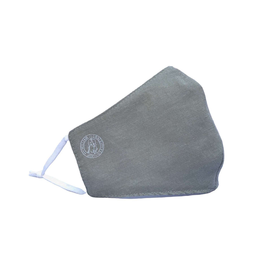 Gray linen face mask with adjustable ear loops, moisture wicking, antibacterial, breathable, logo'd on right cheek with white William grace logo