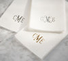 Linen-like absorbent disposable luxury guest towels monogrammed with one to three letters- gold or silver