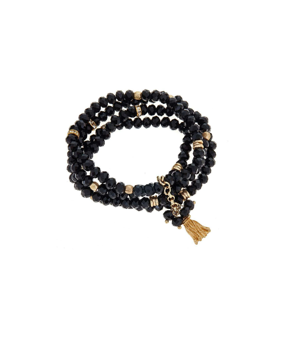 Black beaded bracelet with gold tassle