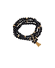 Black beaded bracelet with gold tassle